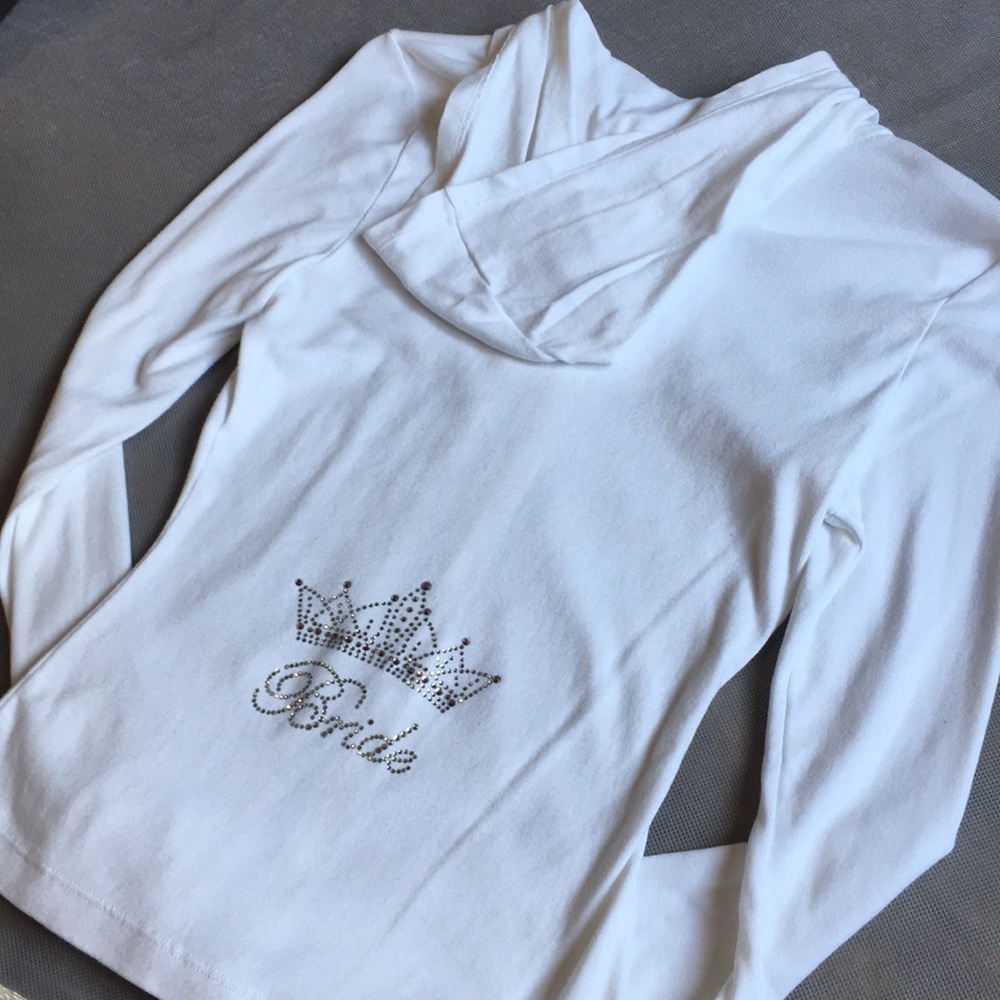 White zip- up Bride sweater.